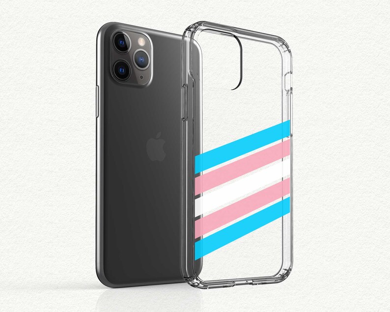 May include: A clear phone case with a transgender pride flag design. The case is made of a clear plastic material and has a raised edge to protect the phone's screen.