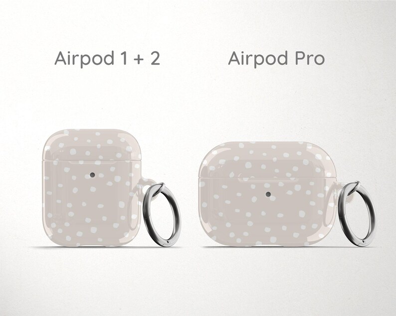 a pair of airpods sitting next to each other