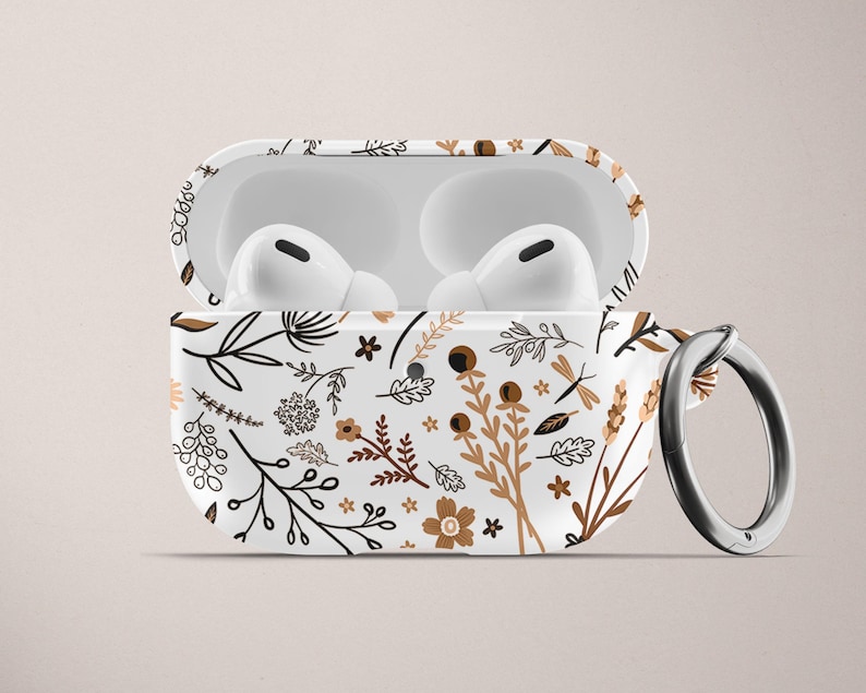 Estuche floral para AirPod de Apple Estuche rígido de plástico para AirPods Pro Estuche para AirPods con llavero en color marrón tostado y blanco Estuche para AirPods con flores en color neutro Estampado floral Lindo imagen 1