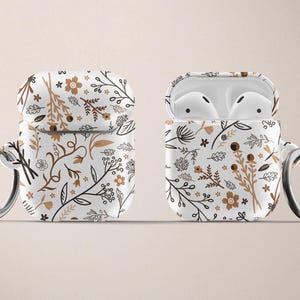 Estuche floral para AirPod de Apple Estuche rígido de plástico para AirPods Pro Estuche para AirPods con llavero en color marrón tostado y blanco Estuche para AirPods con flores en color neutro Estampado floral Lindo imagen 4