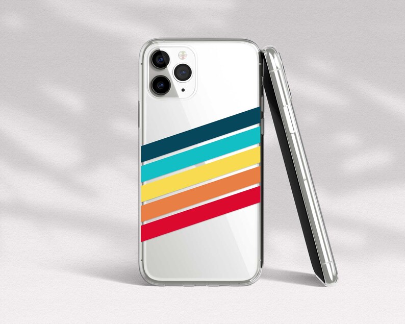 May include: A clear phone case with a colorful striped design. The case has a white background with red, orange, yellow, blue, and teal stripes. The stripes are arranged in a diagonal pattern.