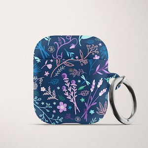 May include: A blue silicone case with a floral pattern for AirPods. The case has a silver metal ring attached to it.
