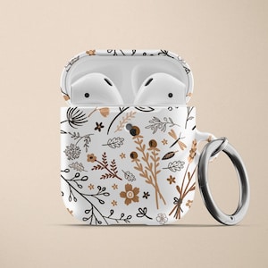 Estuche floral para AirPod de Apple Estuche rígido de plástico para AirPods Pro Estuche para AirPods con llavero en color marrón tostado y blanco Estuche para AirPods con flores en color neutro Estampado floral Lindo imagen 2
