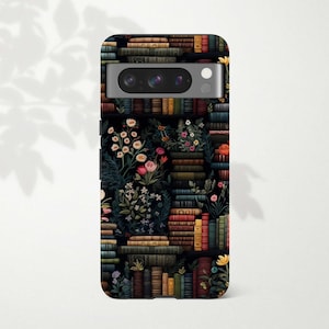 May include: A black phone case with a design of colorful flowers and books. The case has a camera cutout and a black background.