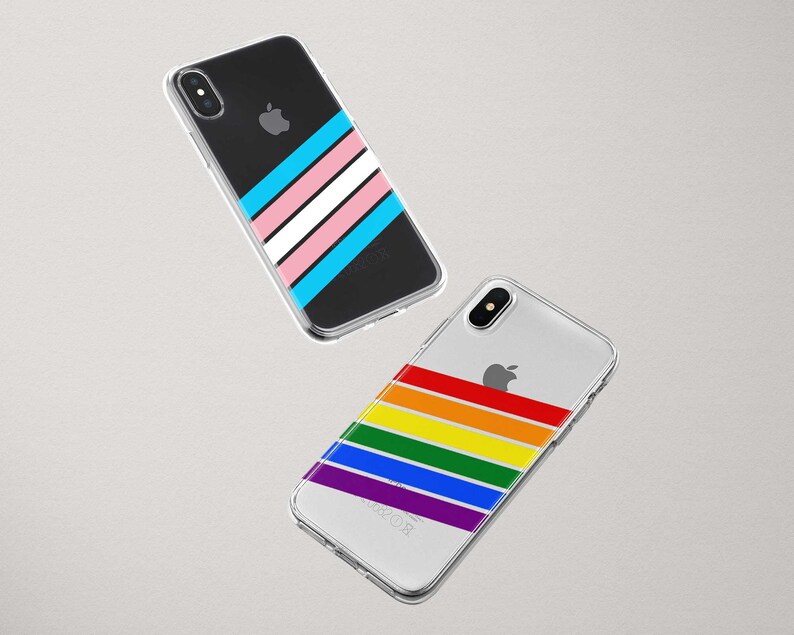 May include: Two clear phone cases with colorful stripes. The first case has a blue, pink, and white stripe design. The second case has a rainbow stripe design.