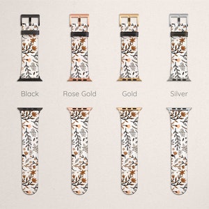 May include: Four Apple Watch bands with a floral pattern. The bands are shown in black, rose gold, gold, and silver.