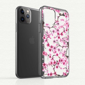 Puede incluir: Una funda transparente para tel&eacute;fono con un dise&ntilde;o de flores de cerezo rosas. La funda est&aacute; hecha de un material duradero y protector y presenta un borde elevado para proteger la pantalla.