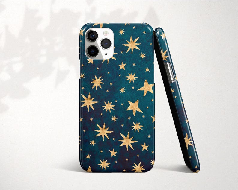 a phone case with gold stars on a blue background