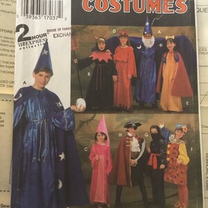 May include: A sewing pattern for children's costumes. The pattern includes a wizard, a devil, a princess, a pirate, a ninja, and a clown. The pattern is from Simplicity Costumes and is size A, S, M, L.