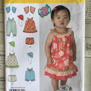 Simplicity 1700 Baby Dress, Romper, and Hat Sewing Pattern (XXS-L)