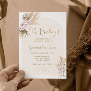 May include: A white baby shower invitation with gold glitter and a watercolour illustration of pampas grass and flowers. The text reads "Oh Baby!" and includes the name "Samantha Owen" and details for the event.