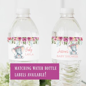 May include: Two clear plastic water bottles with pink and white floral patterned labels. The labels feature a cute cartoon elephant with a pink flower crown. One label says "Baby Layla" and the other says "Jessica's Baby Shower".