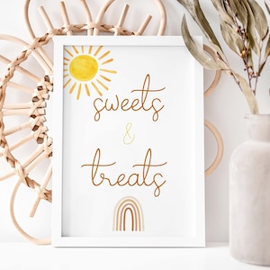 May include: A white framed printable sign with a yellow sun and a rainbow. The sign says "Sweets & Treats" in brown cursive text.