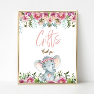 May include: A pink and white floral design with the word "Gifts" in pink script and the words "Thank you" in brown script. A gray elephant with pink polka dots and a pink floral crown sits in front of green leaves and pink flowers.