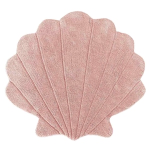 May include: A pink, fluffy, seashell-shaped bath mat. The mat is made of a soft, plush material and is perfect for adding a touch of whimsy to any bathroom.