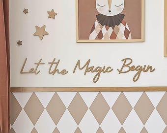 May include: Wooden wall decor featuring the words "Let the Magic Begin" in a cursive script. The decor is mounted on a white wall with a brown and white diamond pattern wallpaper below. There are also wooden stars on the wall.