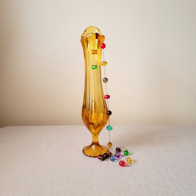 L E Smith Amber Glass Stretch and Swung Pedestal Vase Collectible