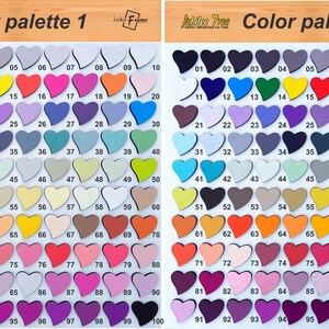 May include: Two color palettes, each with 100 heart-shaped wooden pieces, arranged in rows. The first palette features a variety of pastel colors, while the second palette features a variety of darker colors.