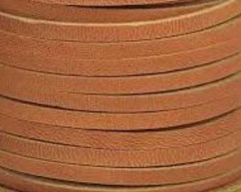 May include: A spool of brown leather cord, approximately 1/8 inch thick.