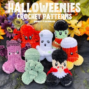 Peut inclure: Une collection de sept peluches en crochet sur le th&egrave;me d'Halloween. Les peluches comprennent un fant&ocirc;me, un vampire, un Frankenstein, un ma&iuml;s sucr&eacute;, une pieuvre, une araign&eacute;e et une cr&eacute;ature violette. Les peluches sont toutes faites &agrave; la main et ont un style mignon et cartoon.