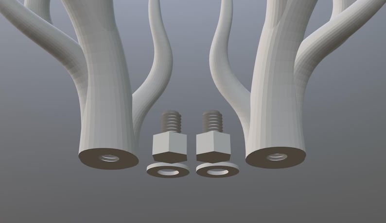 Peut inclure: Une sculpture abstraite gris clair avec deux formes en forme d'arbre et deux ensembles de quincaillerie. Chaque forme en forme d'arbre a une base arrondie avec un trou circulaire. La quincaillerie comprend des boulons, des rondelles et des &eacute;crous.