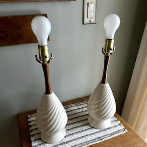 A Pair of Mid Century White Ceramic Lamps | Matching MCM Ceramic and Teak Lamps | White Coiled Ribbed Ceramic and Teak Table Lamps |