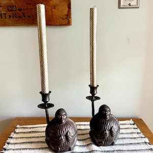 A Pair of Bronze Monkey Candlestick Holders | Asian Influenced Monkey Candle Holders | Monkey Holding Bananas Candlestick Holders
