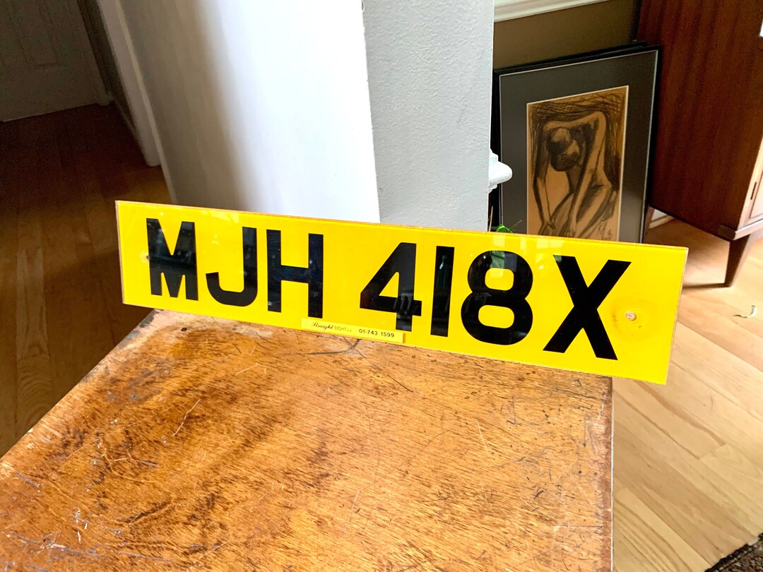 a-vintage-yellow-european-license-plate-clear-straight-eight-ltd