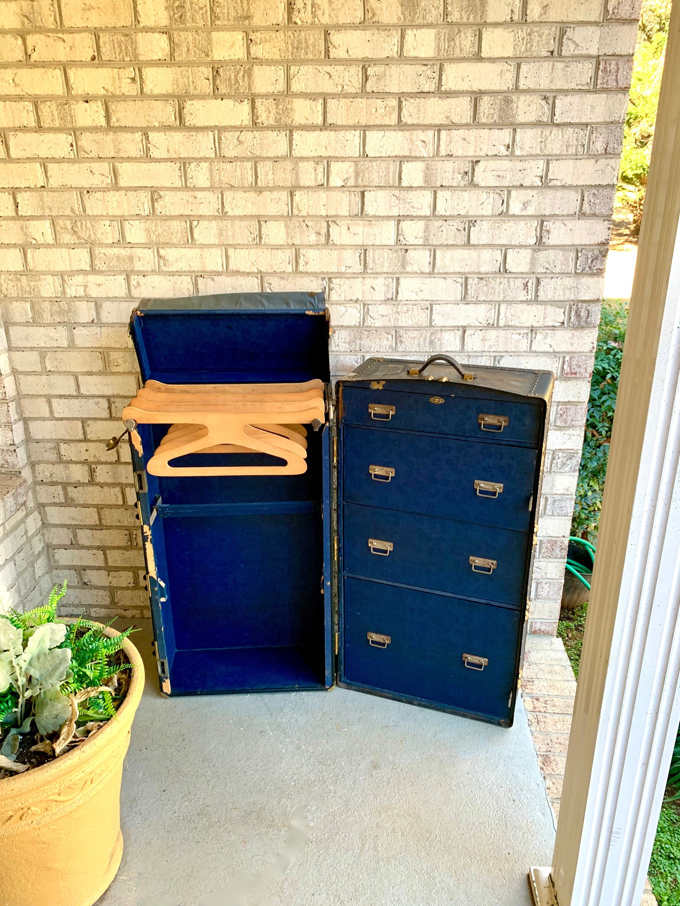 Lot - A large leather steamer trunk wardrobe, Oshkosh Trunks & Luggage