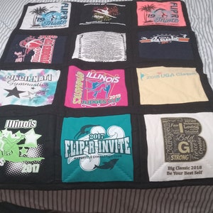 May include: A quilt made from a variety of t-shirts, featuring gymnastics-themed designs. The quilt is made up of nine squares, each with a different design. Some of the designs include the words "Flip-R-Invite", "Illinois Gymnastics", "2018 UGA Classic", and "Big Classic 2018".