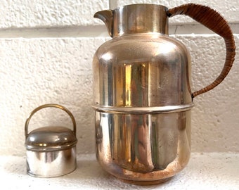 vintage silver  and rattan teapot from Cambridge