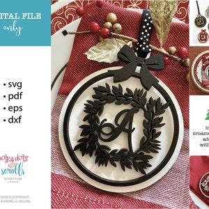 May include: A wooden Christmas ornament with a black wreath and initial "A" design. The ornament is adorned with a black bow and a black and white polka dot ribbon. The image also includes text that says "DIGITAL FILE only".