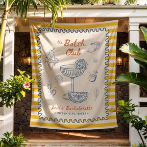 May include: A cream-colored banner with yellow and blue accents, featuring the text "the Batch Club" and "Leon's Bachelorette, Lincoln City, Oregon." The banner has illustrations of cocktails, seashells, and other beach-themed elements.