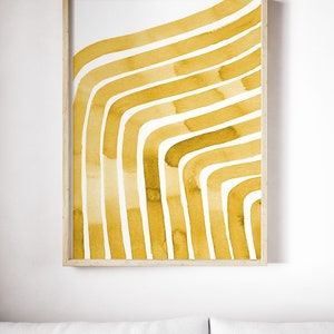 May include: A framed abstract print with a yellow watercolor design of curved lines on a white background.