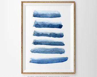May include: Abstract watercolor painting with six horizontal blue stripes of varying shades on a white background. The painting is framed in a light wood frame.
