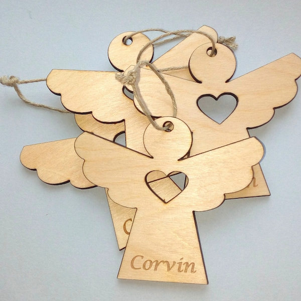 anges en bois, souvenirs pour les invités