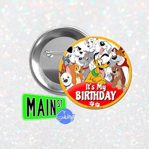 May include: A round button with a red and yellow border. The button features a group of cartoon dogs, including Pluto, Lady, and Tramp. The text "It's My Birthday" is printed in white on a red background. The button is perfect for a dog-themed birthday party.