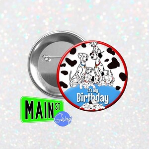 May include: A round button with a red border and a blue background. The button features a family of Dalmatian dogs with black spots. The text "It's My Birthday" is written in white on the blue background.