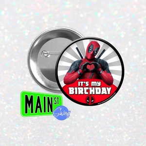 May include: A round button featuring Deadpool in a red and black suit making a heart shape with his hands. The text "It's my birthday" is written in white on a red background.