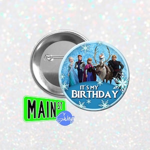 May include: A blue and white button with a picture of the characters from the movie Frozen. The text "It's My Birthday" is printed on the button.