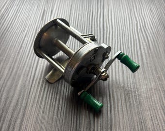 baitcast or conventional reel Shakespeare Agility Low Profile Fishing Reel, Left Hand Abu Garcia Deep Sea Color:Silver Left Hand, No MC #BaitcastFishingReel line out clicker alarm