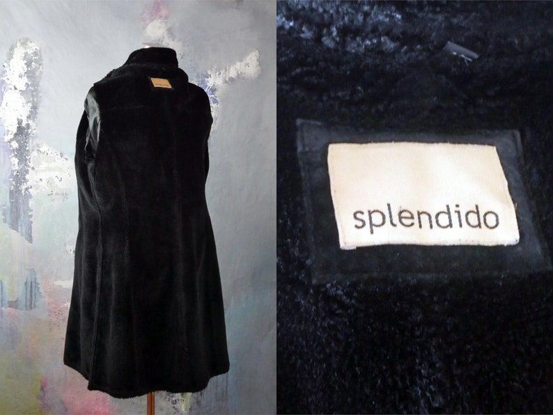 May include: Black faux fur coat with a long, fitted silhouette. The coat has a small label on the back that reads "splendido".