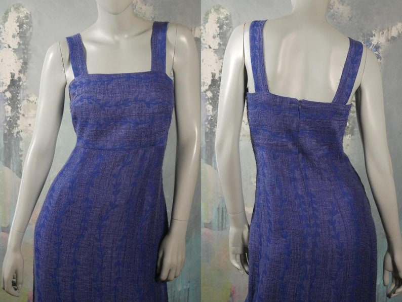 May include: A sleeveless blue dress with a white floral pattern. The dress has a square neckline and a fitted bodice.
