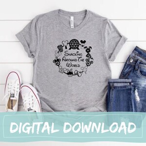 May include: A gray t-shirt with a black design featuring a circle of Disney icons and the text "Snacking Around the World".