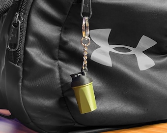 Llavero de regalo para el gimnasio: mini batidora de proteínas / botella mezcladora antiestrés impresa en 3D con tapa extraíble, regalo divertido para amantes del gimnasio y levantadores de pesas.