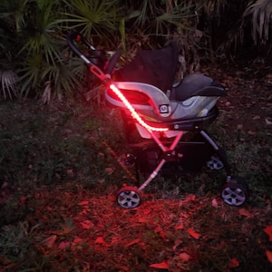 Third Kind® Stroller Lights Make SAFETY FUN! 2 rechargeable, very bright LED light strips for your pram, scooter or anything else.