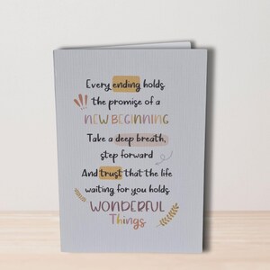 May include: A light blue card with a motivational quote that reads "Every ending holds the promise of a NEW BEGINNING. Take a deep breath, step forward. And trust that the life waiting for you holds WONDERFUL Things."