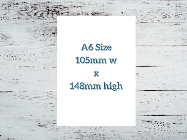 May include: A white card with the text "A6 Size 105mm w x 148mm high" printed in blue.