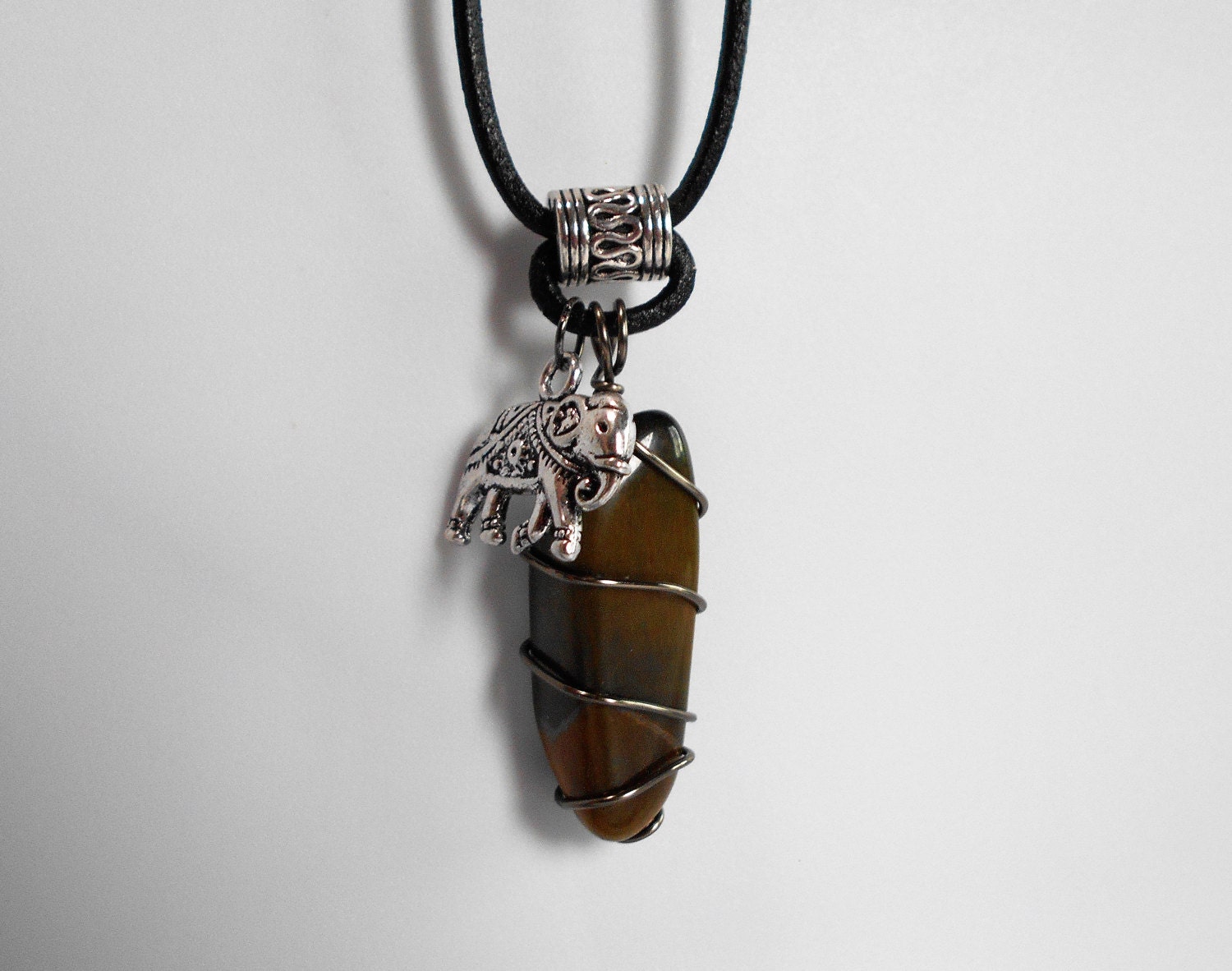 Tiger Eye Pendant Wire Wrapped With Silver Elephant Charm Etsy