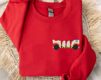 Pull brodé Time Rover | Vêtements de voyage Animal Kingdom